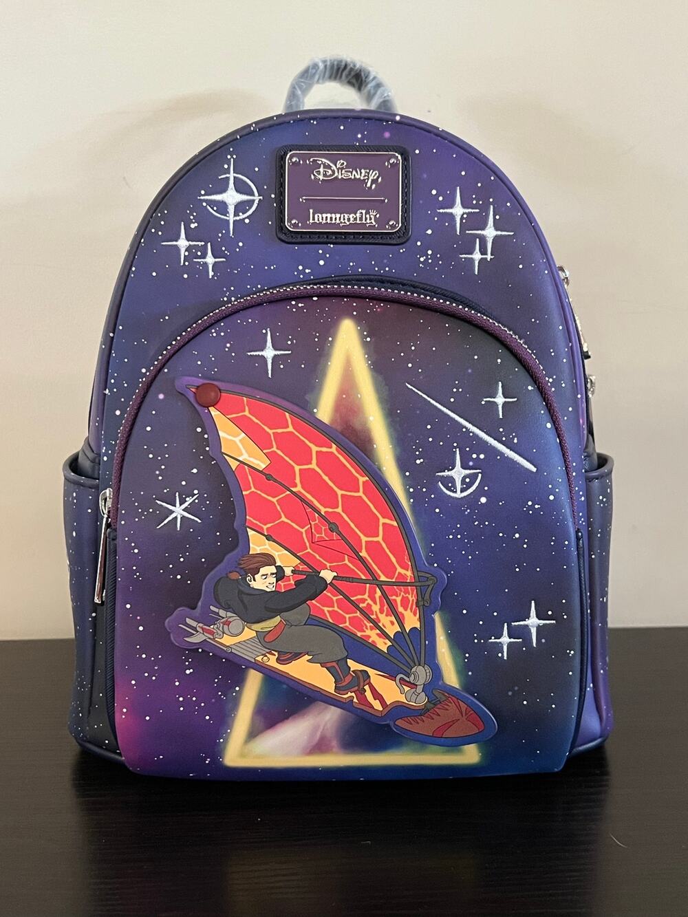 Loungefly Disney Treasure Planet Solar Surfer Glow-in-the-Dark Mini Backpack